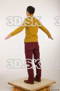 Whole body yellow sweater red trousers brown shoes of Sidney…